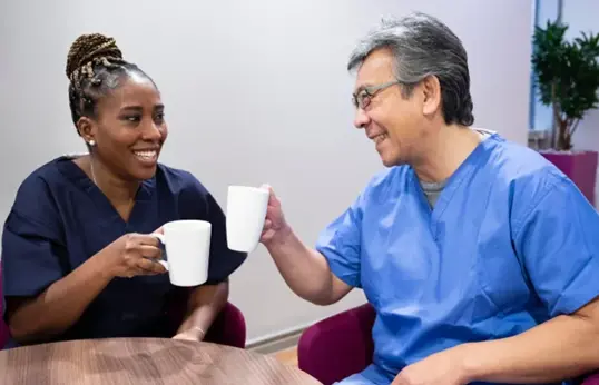 Two Workers With Positive Mental Health In The Workplace News Page