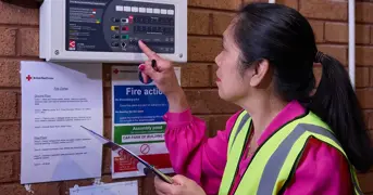 Fire Marshal Checking Fire Alarm Equipment Listing Page