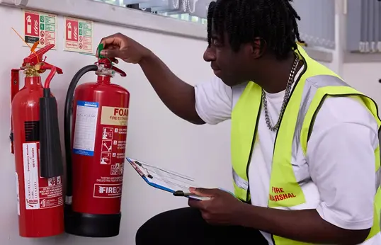Fire Marshal Checking A Fire Extinguisher Blog Page