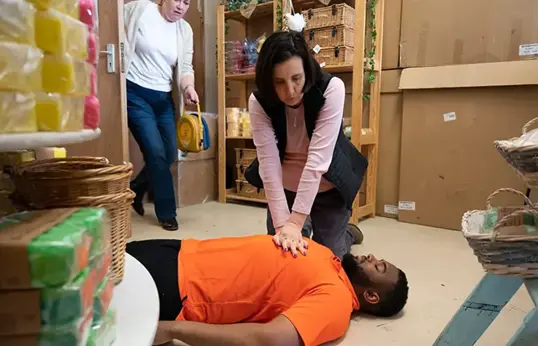 First Aider Performing Cpr In The Workplace Blog Page