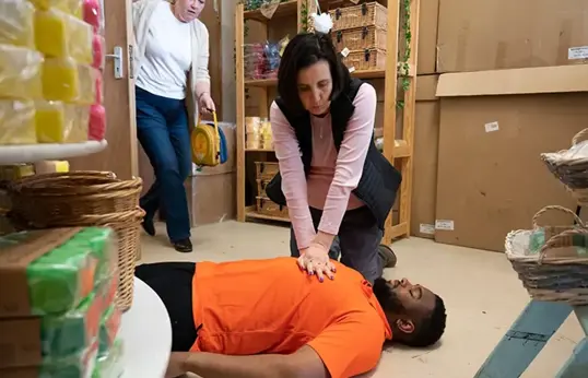 First Aider Performing Cpr In The Workplace Blog Page