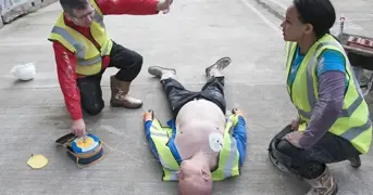 First Aider Using Aed On A Casualty Listing Page